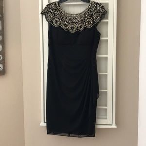Black evening dress with gold beading